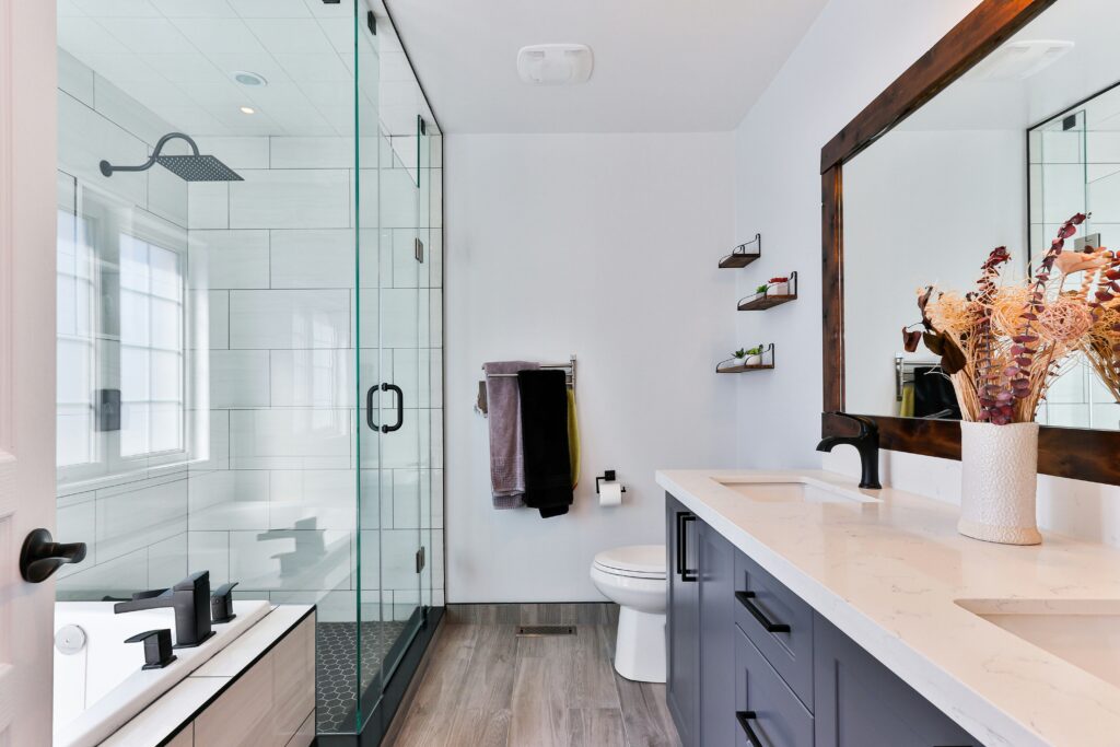 A modern bathroom and walk-in shower.