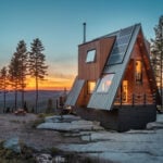 A-frame log cabin in the woods